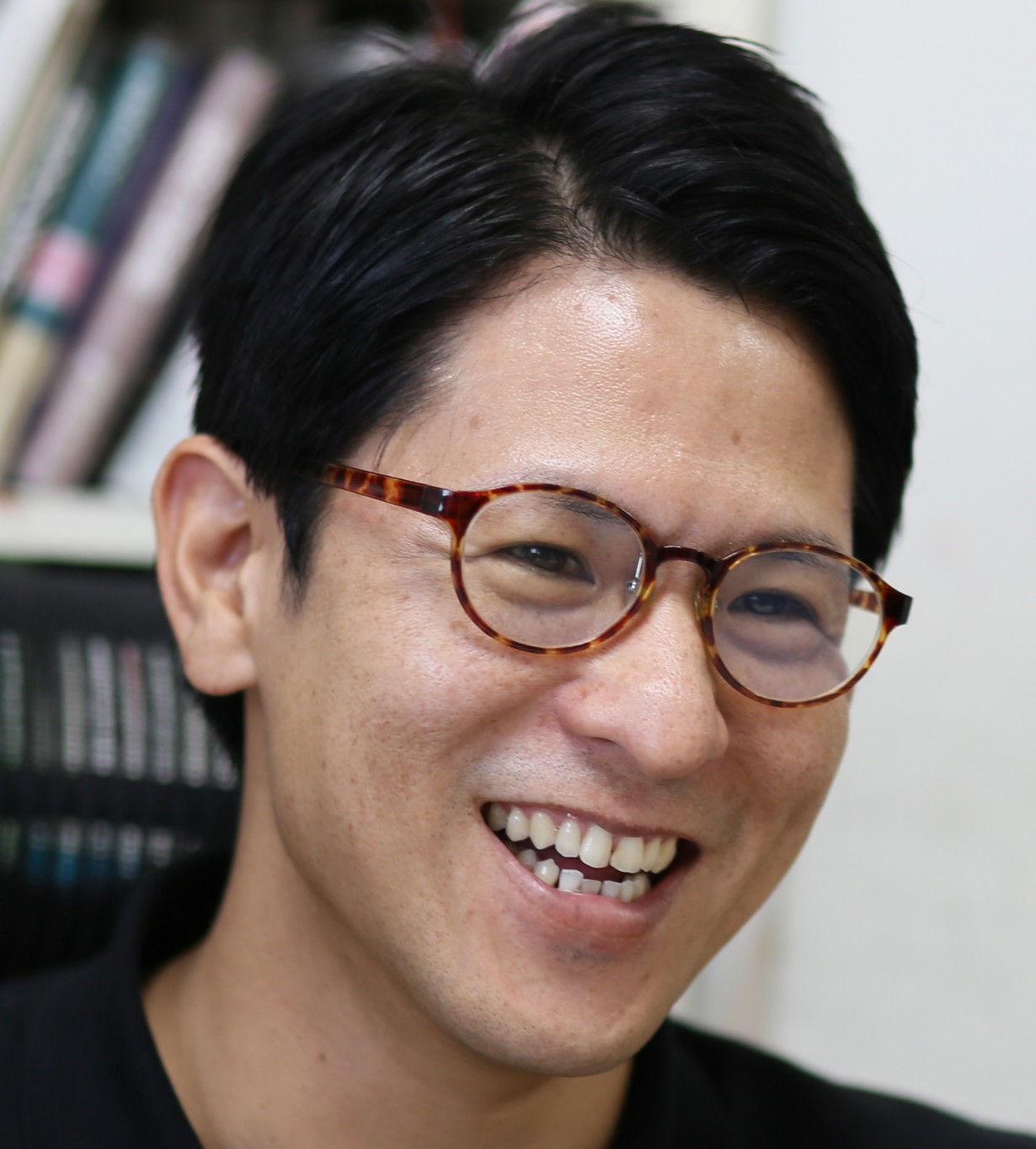 笑顔の上間社長